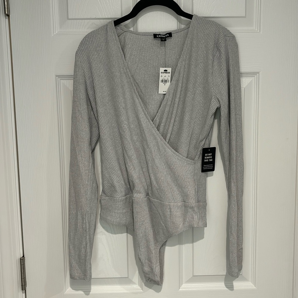 Brand new Express body suit.